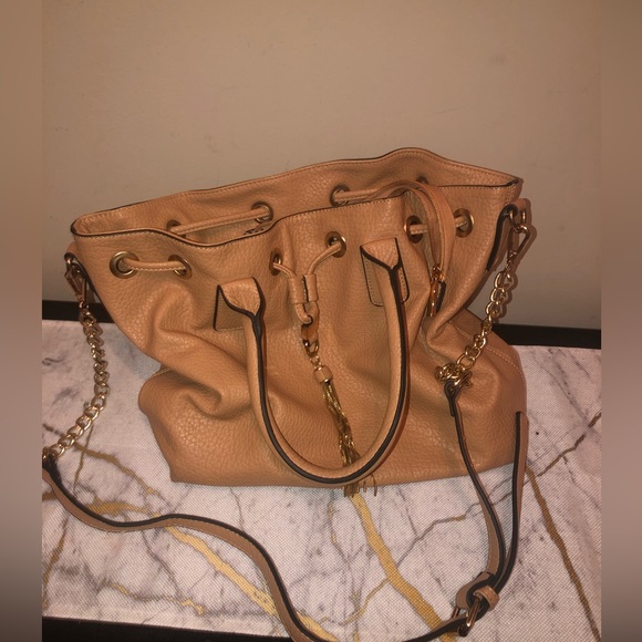 Handbag with black and white stripes inside; classy bag can dress up or down - Picture 5 of 8